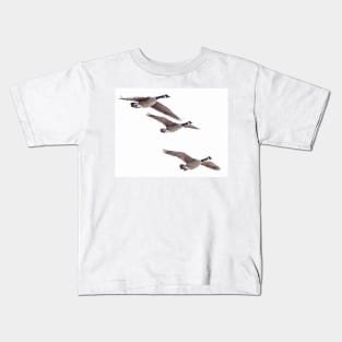 Canada geese in flight Kids T-Shirt